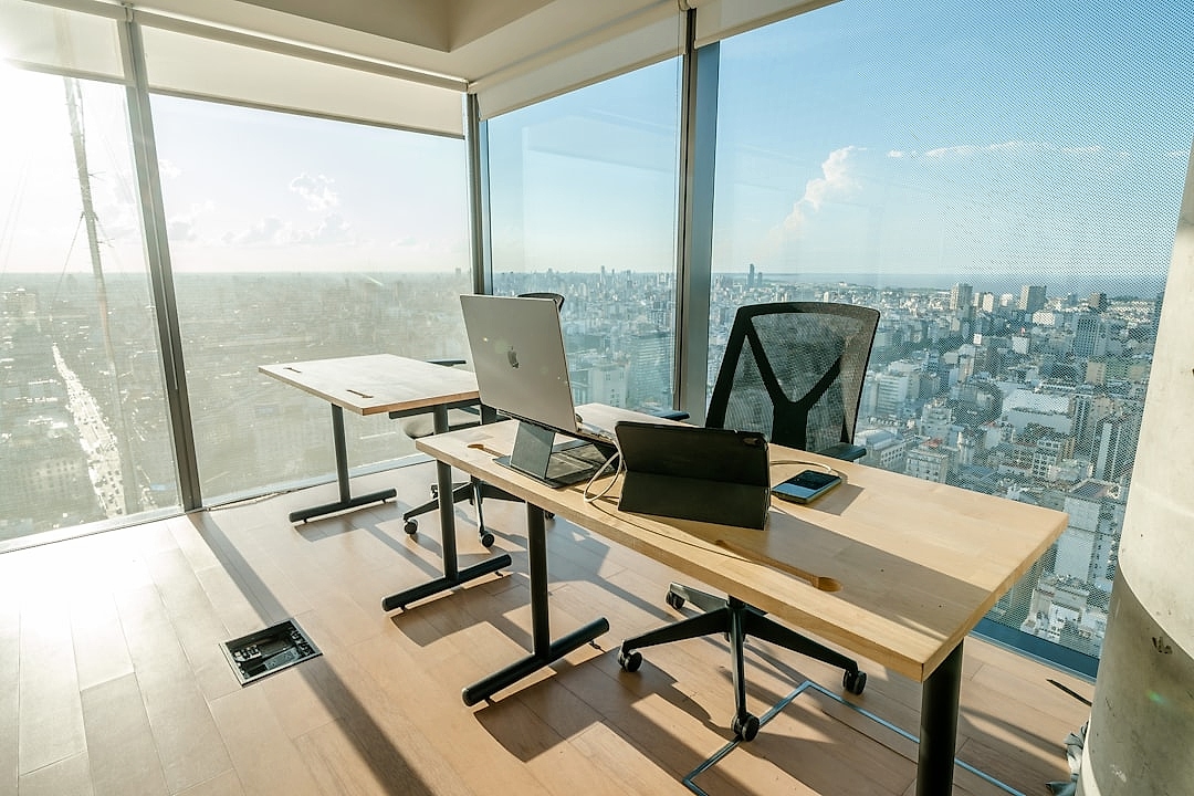 Modern office setting with finance system migration planning materials